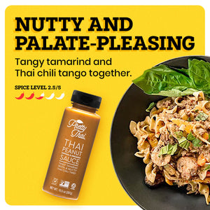 A black plate with some food in it on the yellow background. The border of the background is white. Pretty Thai Peanut Dipping and Dressing Sauce bottle alongside the plate. At the top left corner “ Nutty and Palate-Pleasing” is written in bold black font. Under this text “Tangy Tamarind and Thai Chili Tango Together” is written in black. Under this “Spice Level 2.5/5 ” is written in black and under this text there are 5 chilis present out of which 2.5 are red and others are white.