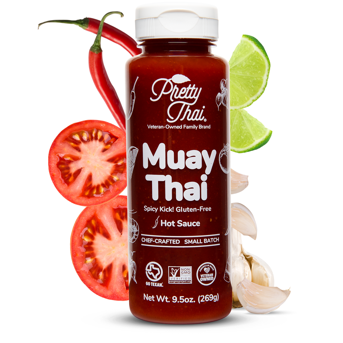 A bottle of Pretty Thai Muay Thai Stir Fry and dipping Sauce, which has savory with a thai chili kick and citrus tang. Net WT. 9.5 0z (269 g) is also written on it under different labels. In the background, different vegetables can be seen. 